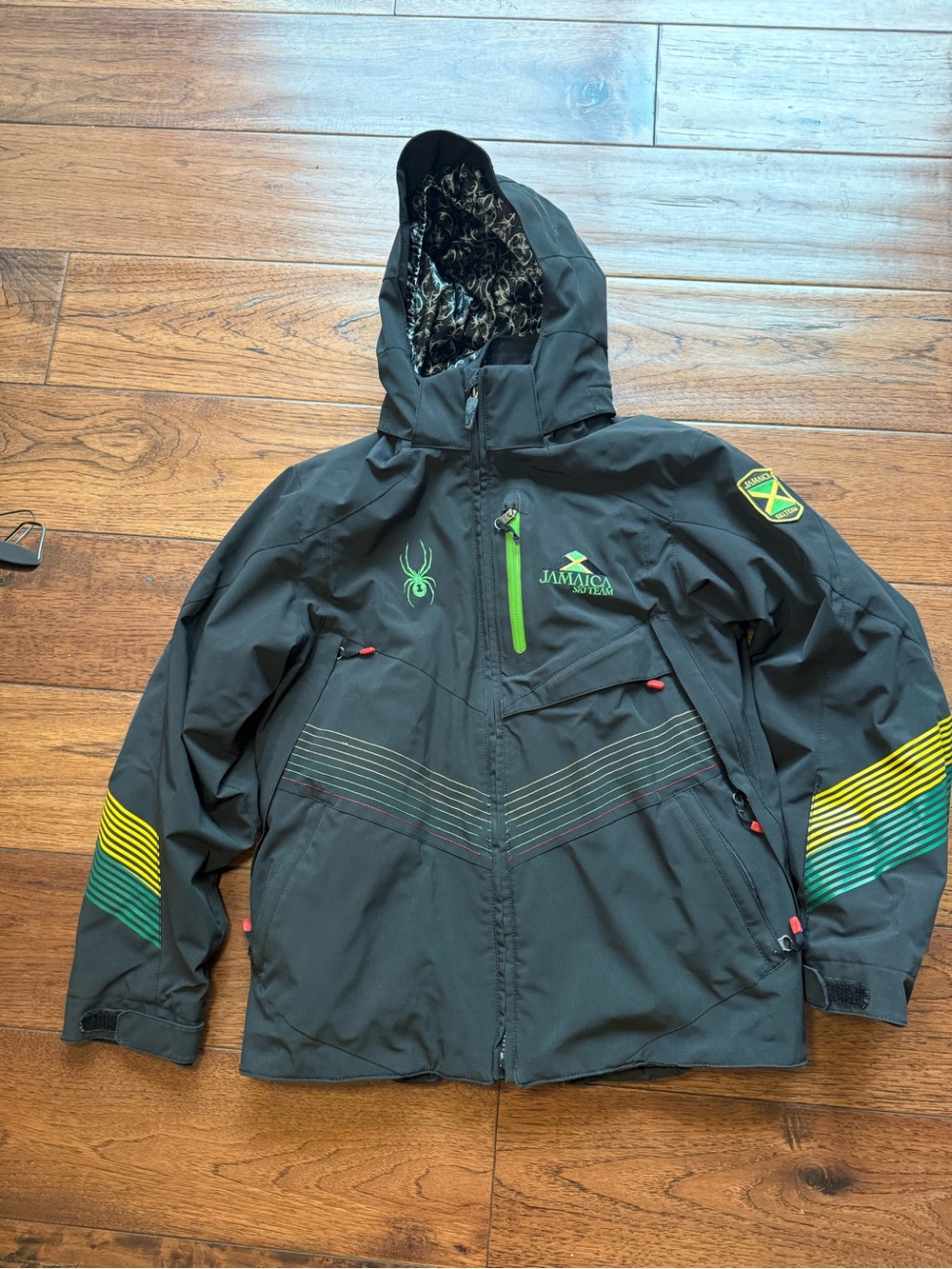 Spyder Jamaica Themed Kids Hooded Ski Jacket - Black with Green & Yellow Accents